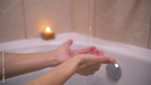 Wallpaper Mural Testing the Water Temperature with Hands Torontodigital.ca