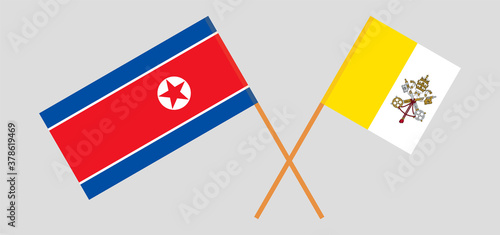 Crossed flags of Vatican and North Korea