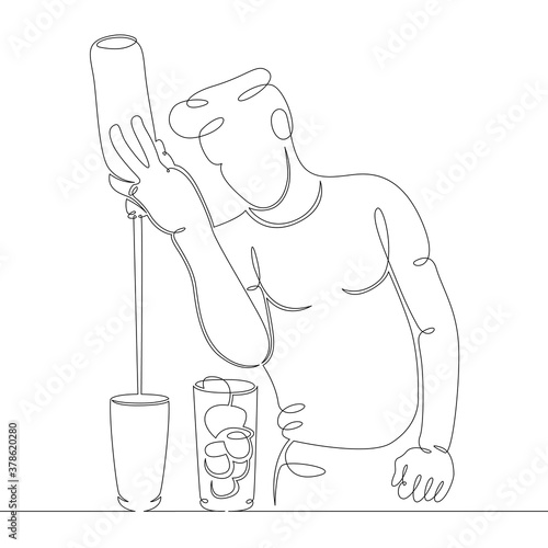 bartender stirring cocktail at the bar