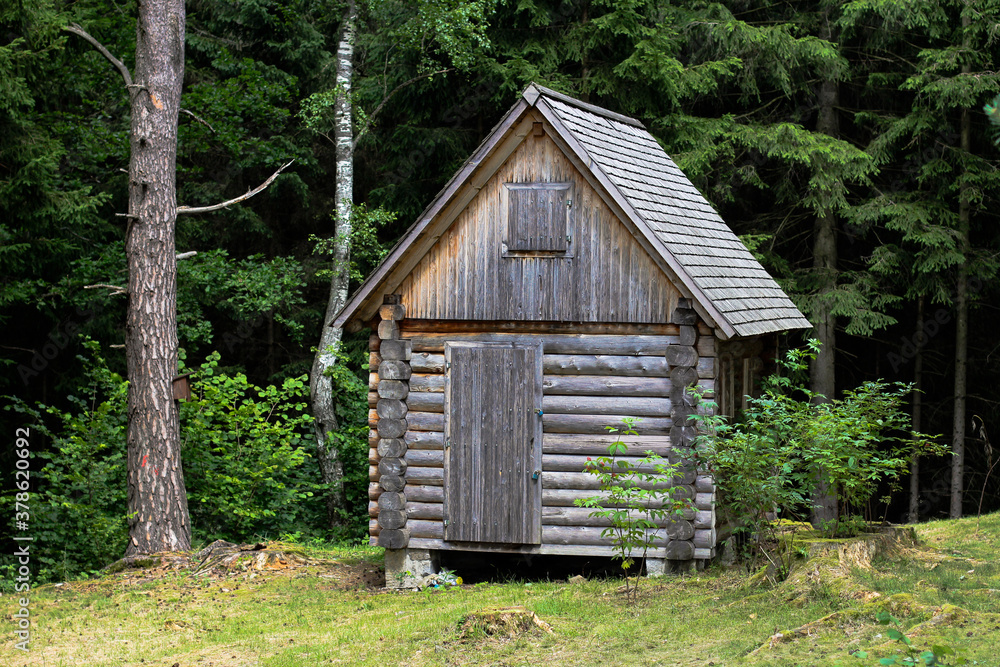 Abandoned and locked cabin in the woods Abandoned and locked cabin in the woods