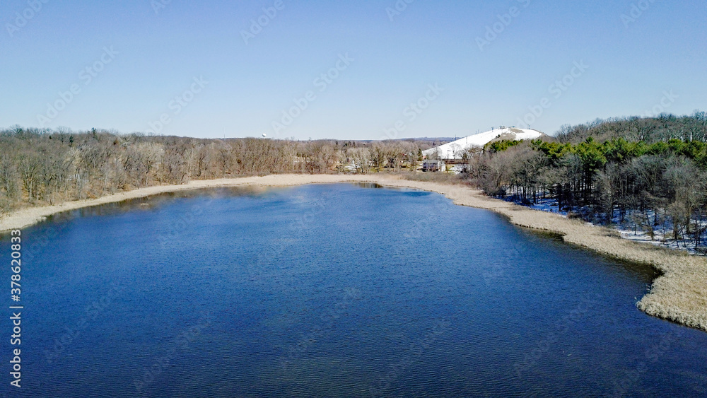 Lake and Ski Hill Aerial in Spring