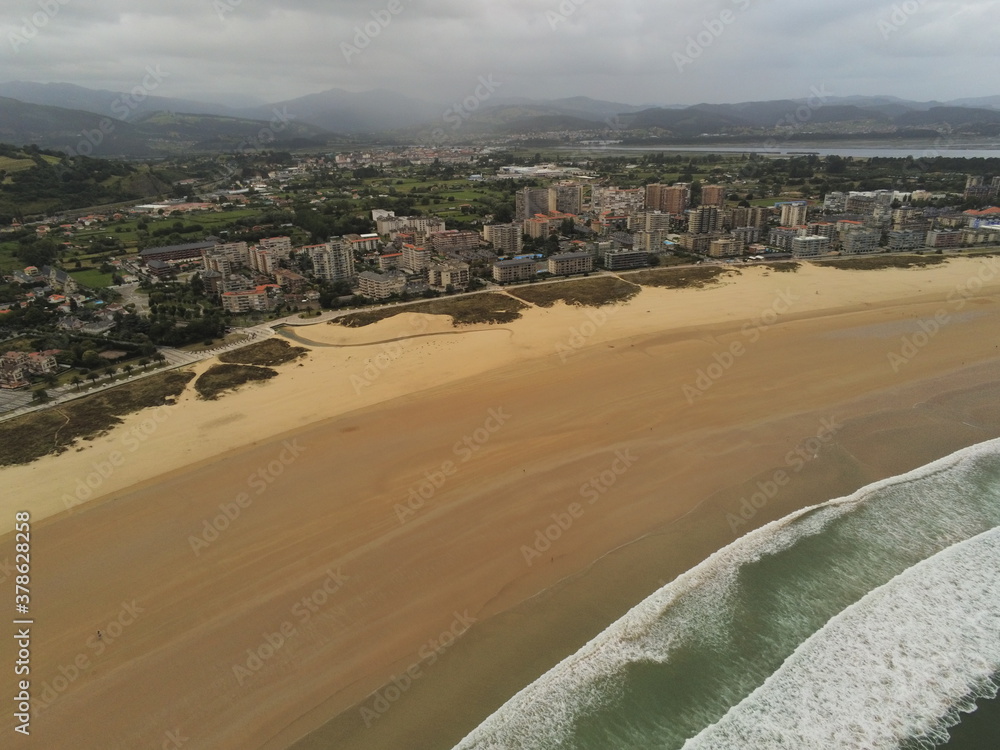 Aerial view of waves in beach of Spain. Drone Photo