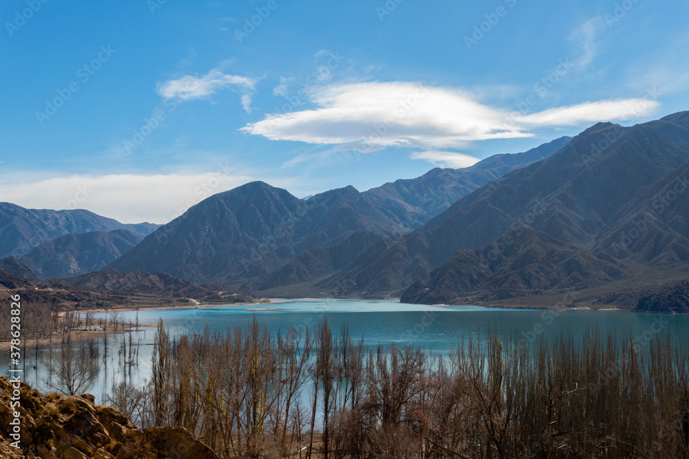 Majestic Potrerillos Mountains in front of the lake.
