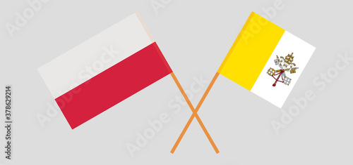 Crossed flags of Vatican and Poland