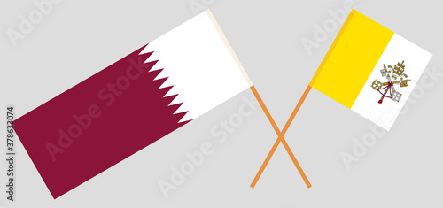 Crossed flags of Vatican and Qatar