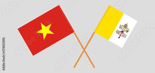 Crossed flags of Vatican and Vietnam