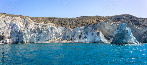 Panoramic view of white beach, Akrotiri, Santorini, Cyclades, Greece. Shot from sailing boat. blue sea and blue sky © mathilde