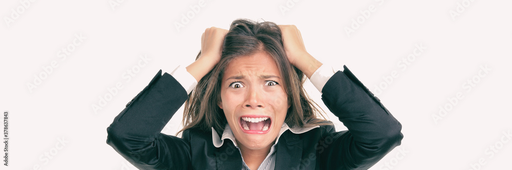 Funny crazy Asian business woman screaming in panic over stress at work.  Mental health, anxiety, stressed out concept panoramic. Stock Photo | Adobe  Stock