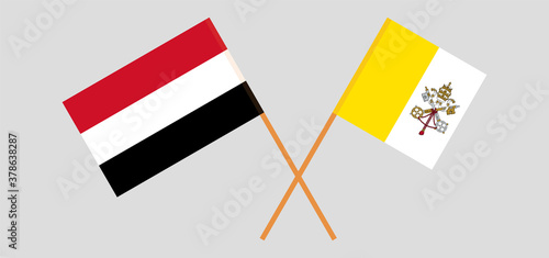 Crossed flags of Vatican and Yemen