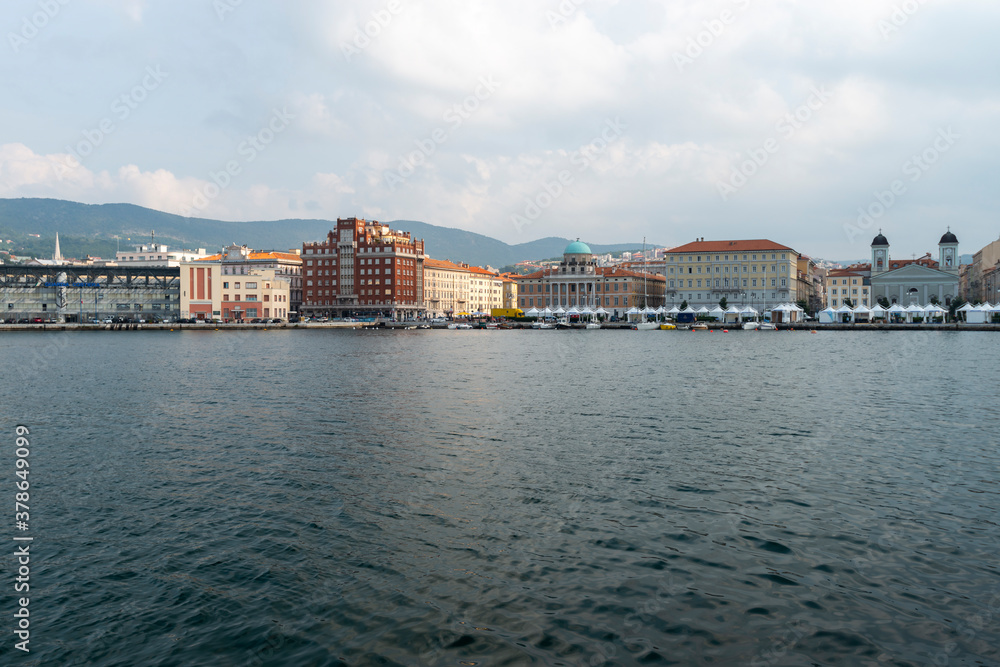 Trieste, Italy - October 07, 2014: City promenade, Trieste sea coast, local architecture