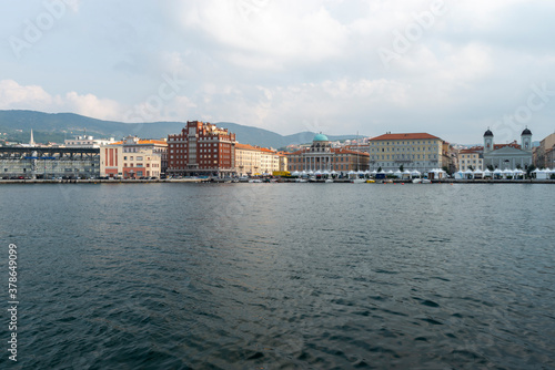 Obraz na płótnie Trieste, Italy - October 07, 2014: City promenade, Trieste sea coast, local architecture w salonie
