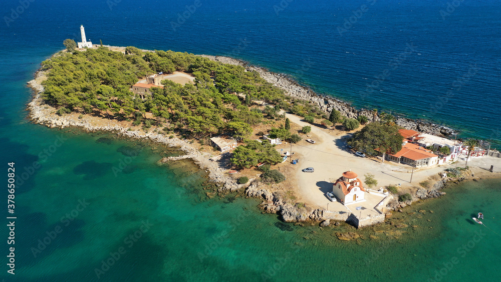 Aerial drone photo of famous small islet of Kranai known for old lighthouse and tower of Tzannetakis, Gytheio, Lakonia, Peloponnese, Greece