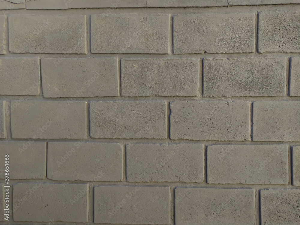 Fototapeta premium gray wall background with bricks in horizontal format
