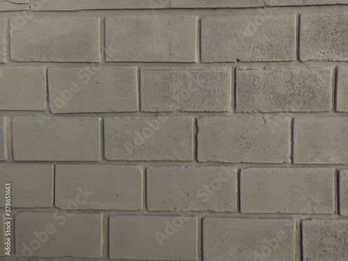  gray wall background with bricks in horizontal format