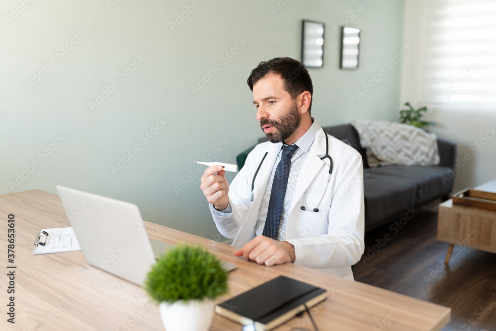 Doctor talking about fever on a video call Doctor talking about fever on a video call