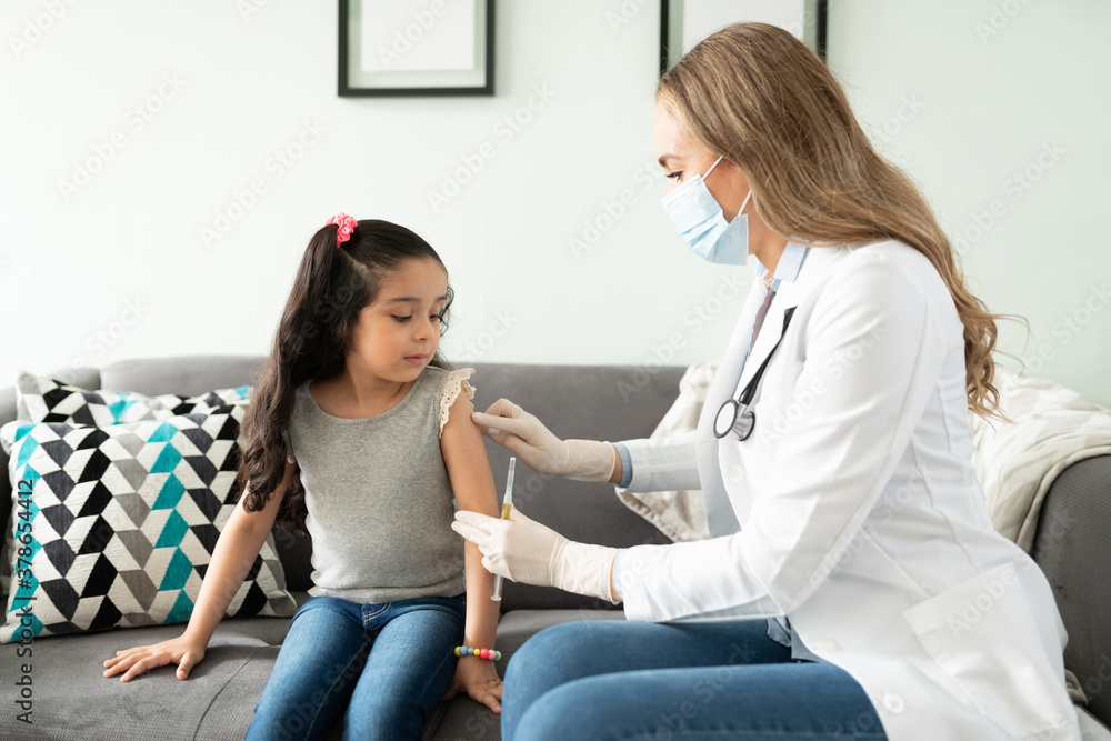 Doctor explaining where the needle goes in Doctor explaining where the needle goes in