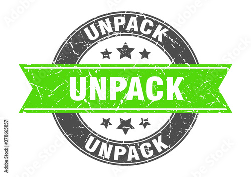 unpack round stamp with ribbon. label sign