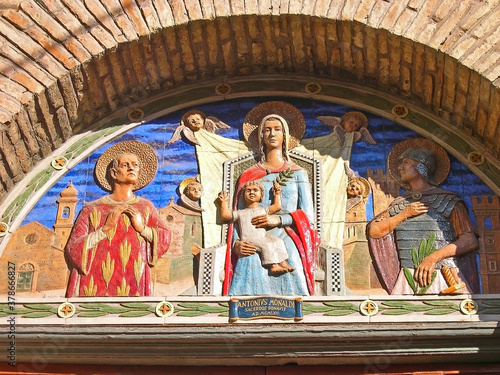 Italy, Marche, Castelfidardo, Collegiata di Santo Stefano church door decoration. photo