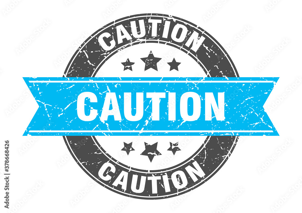 Fototapeta premium caution round stamp with ribbon. label sign