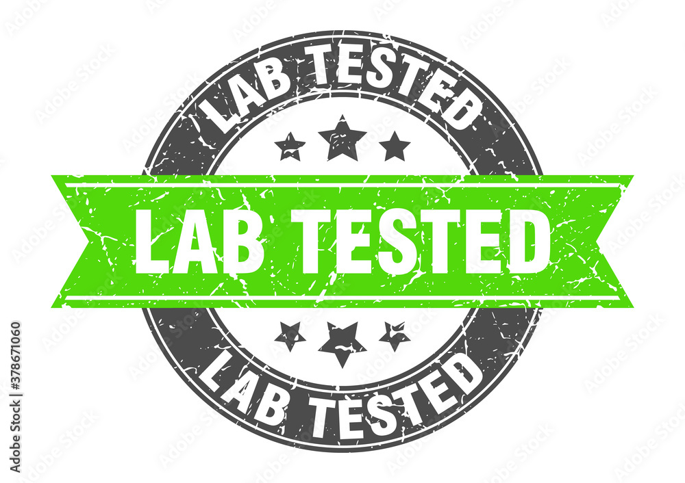 Obraz premium lab tested round stamp with ribbon. label sign