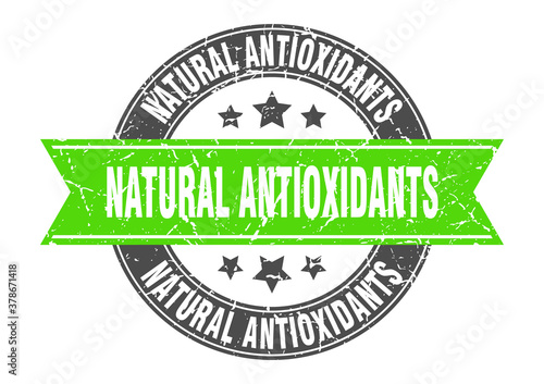 natural antioxidants round stamp with ribbon. label sign