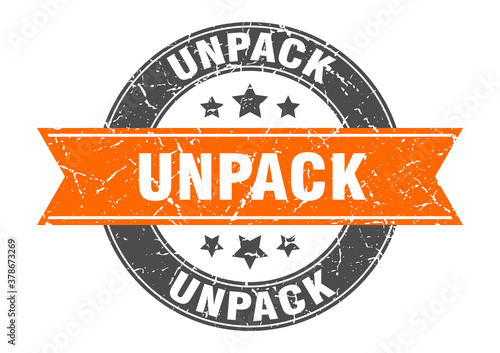 unpack round stamp with ribbon. label sign