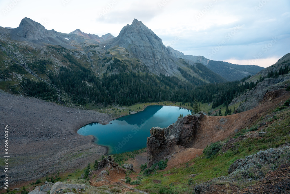 Obraz premium Backpacking trip in the San Juan Mountains of the Rocky Mountain Range near Mount Sneffels Wilderness around Blue Lakes outside of Ouray Colorado