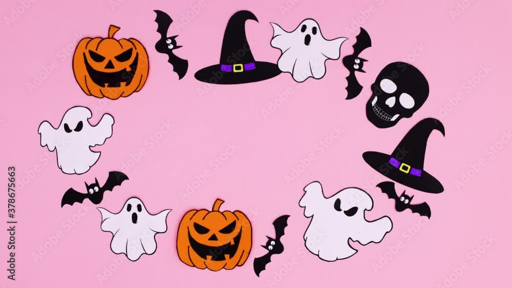 Halloween pumpkins, bats, ghosts, witch hat move in circle with empty space inside on pink theme. Stop motion Halloween pumpkins, bats, ghosts, witch hat move in circle with empty space inside on pink theme. Stop motion