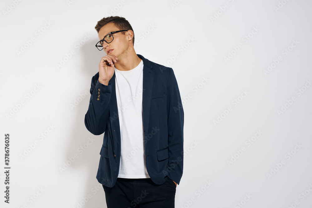 Business man in a jacket wearing glasses manager self-confidence light background Business man in a jacket wearing glasses manager self-confidence light background