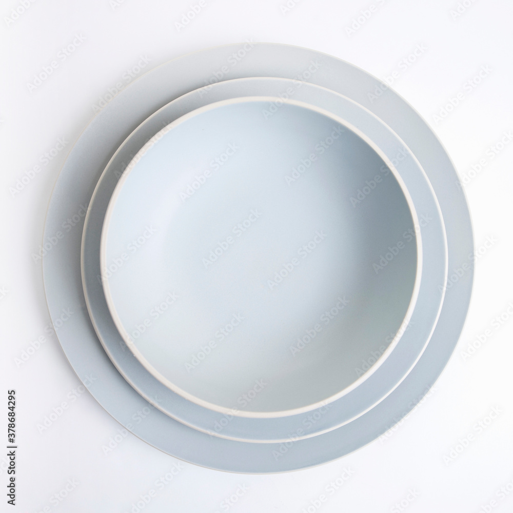 pile of plates on white background pile of plates on white background