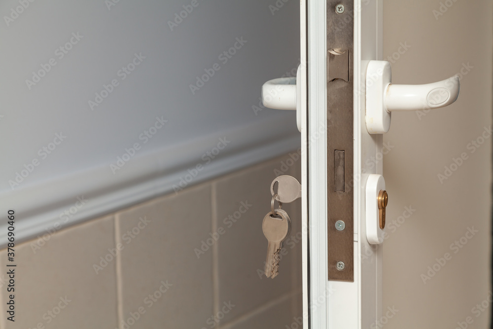 Mortise lock inside plastic door close up Mortise lock inside plastic door close up