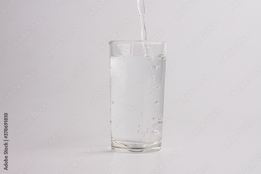 pouring water isolated on a white background pouring water isolated on a white background