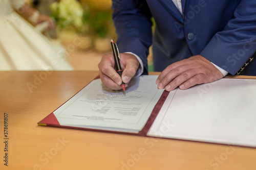 Signature of the groom at wedding day
