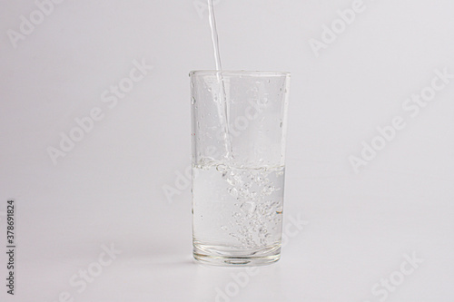 pouring water isolated on a white background