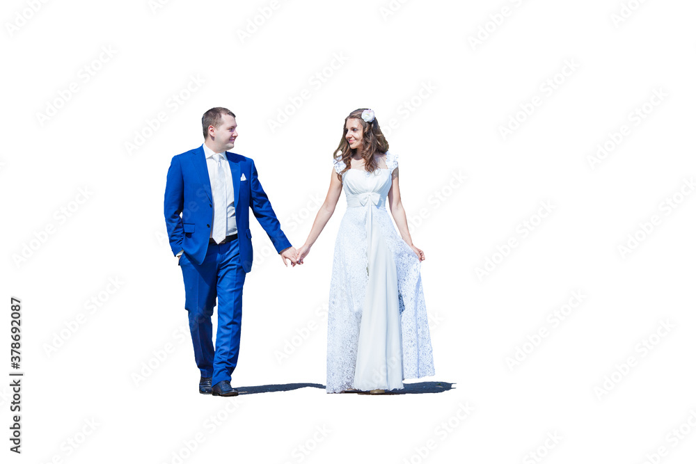 Happy young wedding couple walking holding hands. Isolated on white. Just married couple on stroll. Happy young wedding couple walking holding hands. Isolated on white. Just married couple on stroll.
