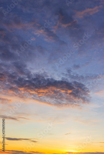 Sticker sunset in the evening sky on dusk vertical