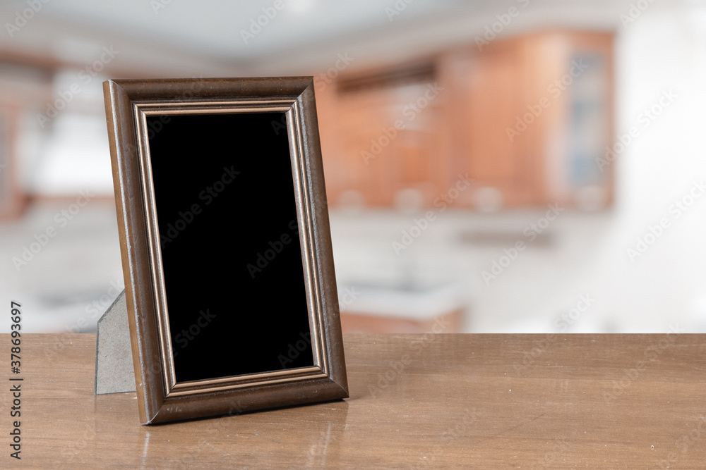 Fototapeta premium photo frame on the wooden table