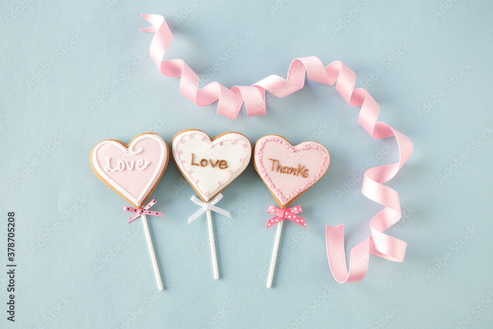 heart shaped icing cookies and ribbon