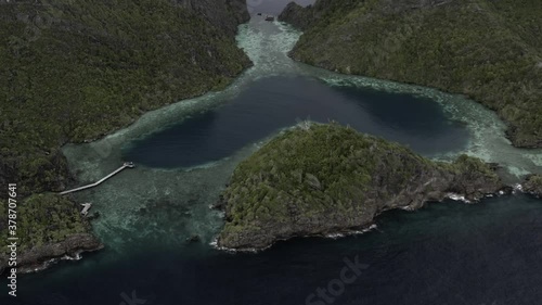 Raja Ampat, Misool, Palau Karawapop, Geosite, Love Lake Misool.  Reveal of Love Lake, Flyover and Landing.