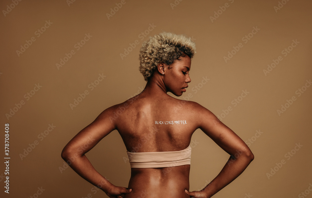 Fototapeta premium Rear view of african american woman