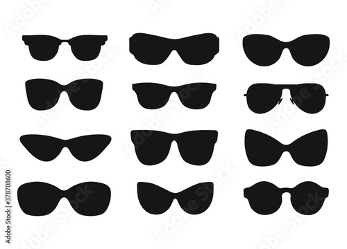 Set of cute hand drawn silhouette of sunglasses different shapes. Vector sketch style. 