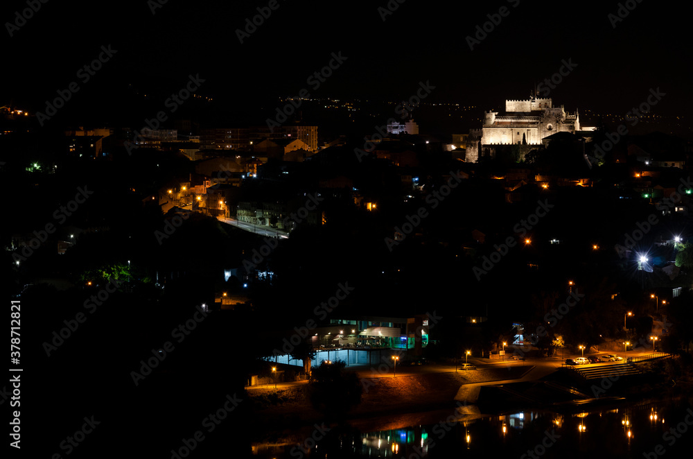 Night view of the Spanish city of Tui from the Portuguese city of Valença do Minho. The river Miño or Minho, is the border between Spain and Portugal.