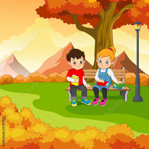 Cartoon kids sitting on bench with a books under a tree in autumn park