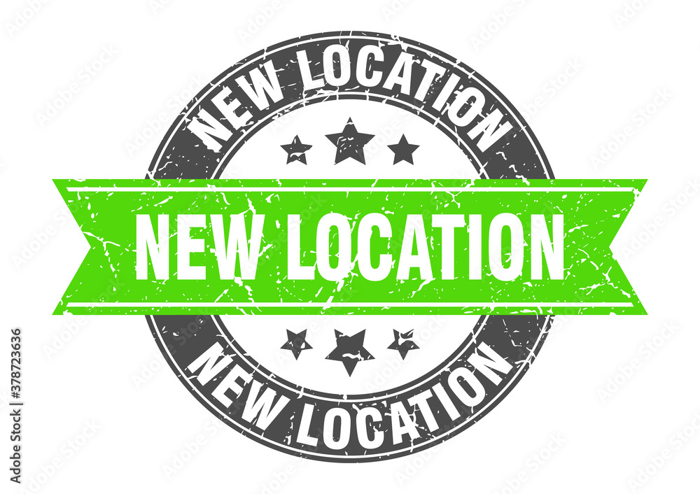 Fototapeta premium new location round stamp with ribbon. label sign