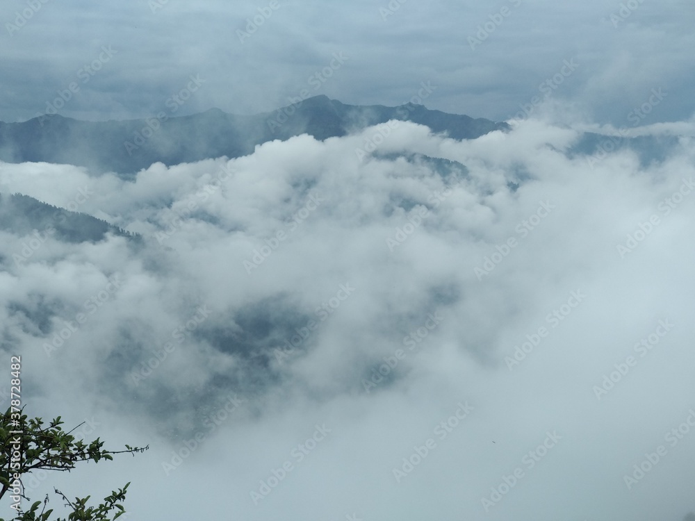 clouds over mountain clouds over mountain