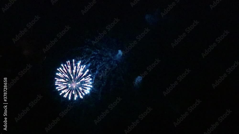 Fireworks going off in the distance, black background. Fireworks going off in the distance, black background.