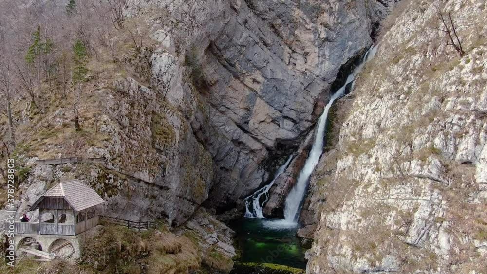 Aerial Follow Shot Of Savica Waterfall Flowing Down Mountainside Aerial Follow Shot Of Savica Waterfall Flowing Down Mountainside