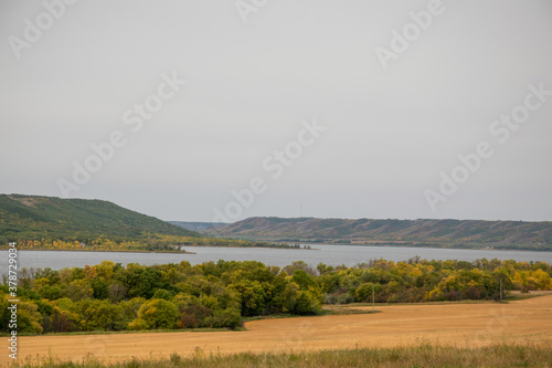 Scenic River Valley with trees in Autumn