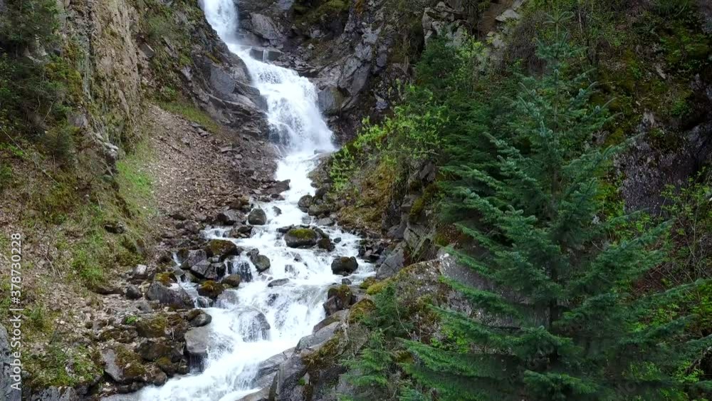 View of waterfall in Alaska in all its glory. Popular destination on Reid Creek. Slow, Steady ascending and impressive natural beauty. View of waterfall in Alaska in all its glory. Popular destination on Reid Creek. Slow, Steady ascending and impressive natural beauty.
