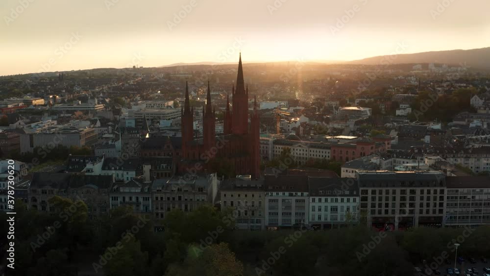Drone aerial of Wiesbaden with its Marktkirche in perfect low evening light showing the city in the background Drone aerial of Wiesbaden with its Marktkirche in perfect low evening light showing the city in the background